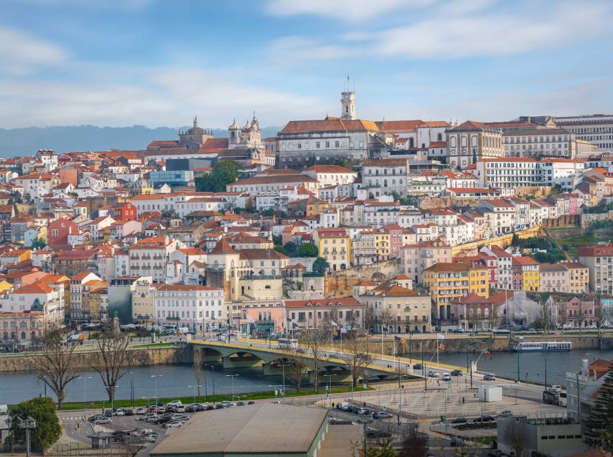 Aerial view of Coimbra Skyline with Mondego River, University and Cathedral - Coimbra, Portugal