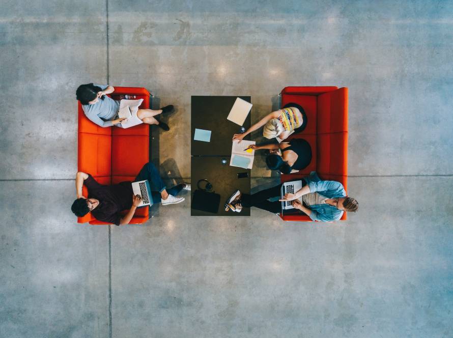 University students with books and laptop